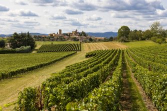 Medieval village of Oingt built in golden stones typical of this region of Beaujolais from the surrounding vineyards